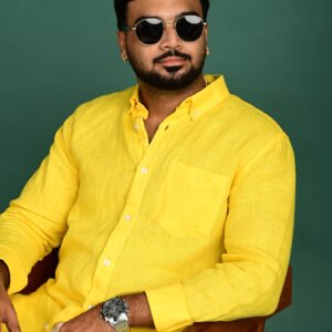 Men wearing a bright yellow pure linen full sleeve shirt with button-down collar and chest pocket.
